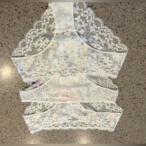 UCA NWT never tried on 3 pair white lace bikini size  Large